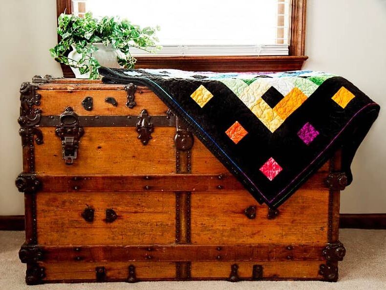 Vintage Chest with Quilt